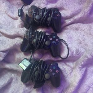 3 playstation 2 controllers